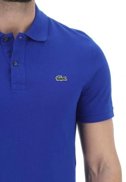 Polo A Maniche Corte Lacoste In Cotone Con Logo Ricamato -Negozio Da Uomo Alla Moda 1f66fb2ae22160e9a6d08247b1894d6c