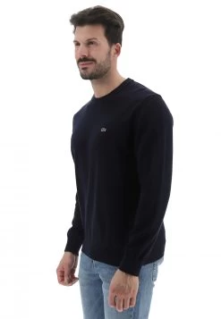 Maglioncino Girocollo Lacoste Uomo Tinta Unita Con Logo A Contrasto Sul Petto -Negozio Da Uomo Alla Moda 32107103dc972e139e2c58e202d2c3f2
