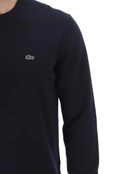 Maglioncino Girocollo Lacoste Uomo Tinta Unita Con Logo A Contrasto Sul Petto -Negozio Da Uomo Alla Moda 3d243e734ad813e77a0bacb3fb4f8456