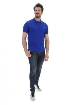 Polo A Maniche Corte Lacoste In Cotone Con Logo Ricamato -Negozio Da Uomo Alla Moda 6c7a4e2adb3fc98ddde3670467cca237
