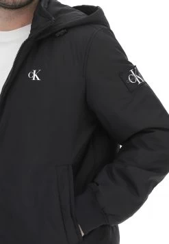 Calvin Klein Jeans Bomber Con Cappuccio Calvin Klein Jenas Uomo Full Zip Con Logo Piccolo Sul Petto -Negozio Da Uomo Alla Moda 78a03bdf21fae07636c0adf760223be1