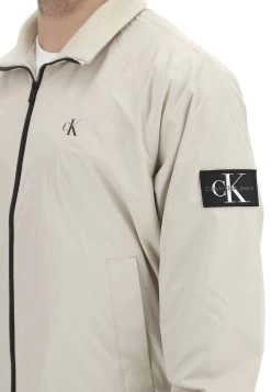 Calvin Klein Jeans Giubbino Calvin Klein Uomo Tinta Unita Con Zip E Logo A Contrasto 12 Calvin Klein Jeans Giubbino Calvin Klein Uomo Tinta Unita Con Zip E Logo A Contrasto -Negozio Da Uomo Alla Moda ee04122f6dd29ce4bc522339c1ce7a18